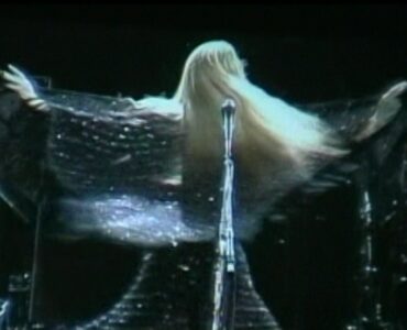 Stevie Nicks twirls during Stand Back