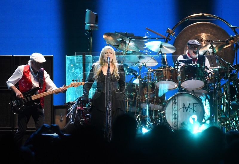 (L-R) Bassist John McVie, singer Stevie Nicks and drummer Mick Fleetwood of the US-British band 'Fleetwood Mac' perfom on a stage at the Lanxess arena in Cologne, Germany, 04 June 2015 evening, during the only cocert in Germany within their current European tour.  (EPA/Henning Kaiser)